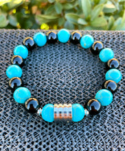 Load image into Gallery viewer, Men&#39;s 10mm Blue Howlite and Black Onyx Healing Bracelet
